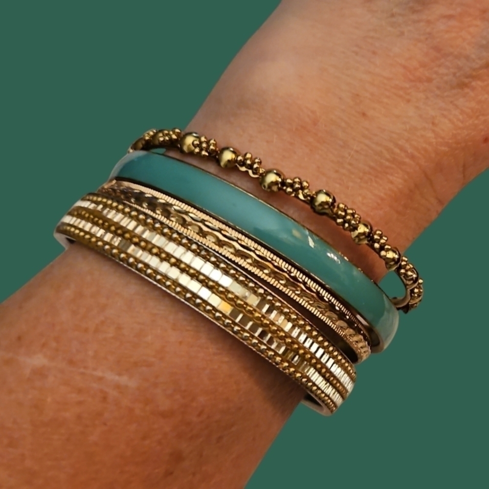 Stack of Four Goldtone Teal Bangle Bracelets